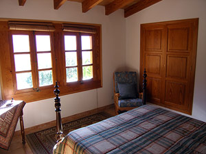 The second bedroom in the first floor. Both offer very nice views into the mountains.